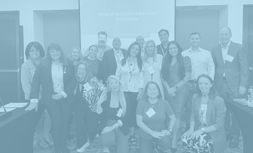 Roundtable group photo with blue overlay